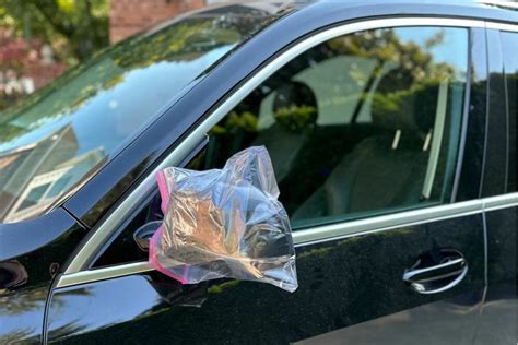 place bag on mirror when traveling alone|putting plastic bags over mirrors.